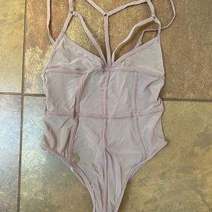 Blush sheer caged bodysuit with tags